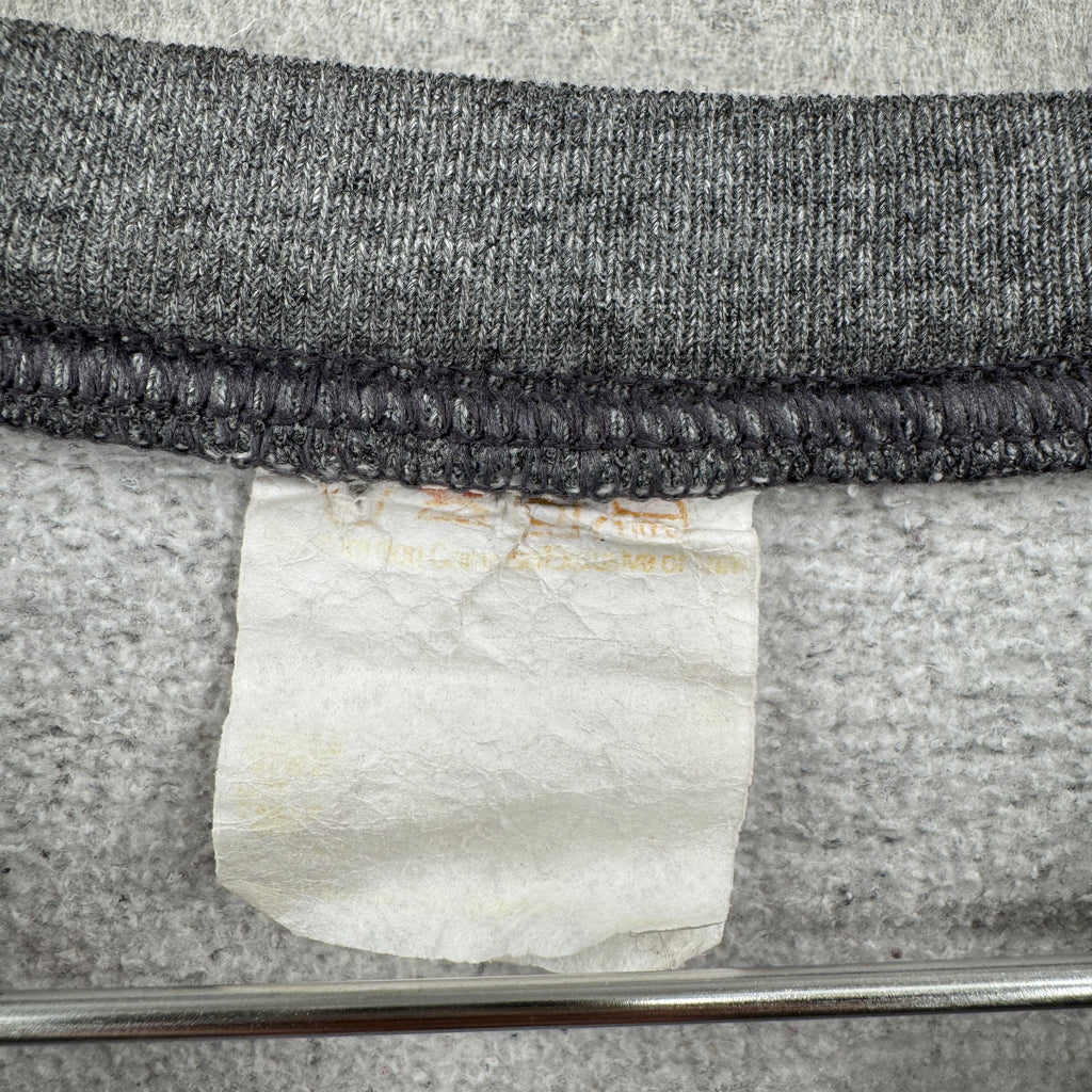Close-up of a faded tag