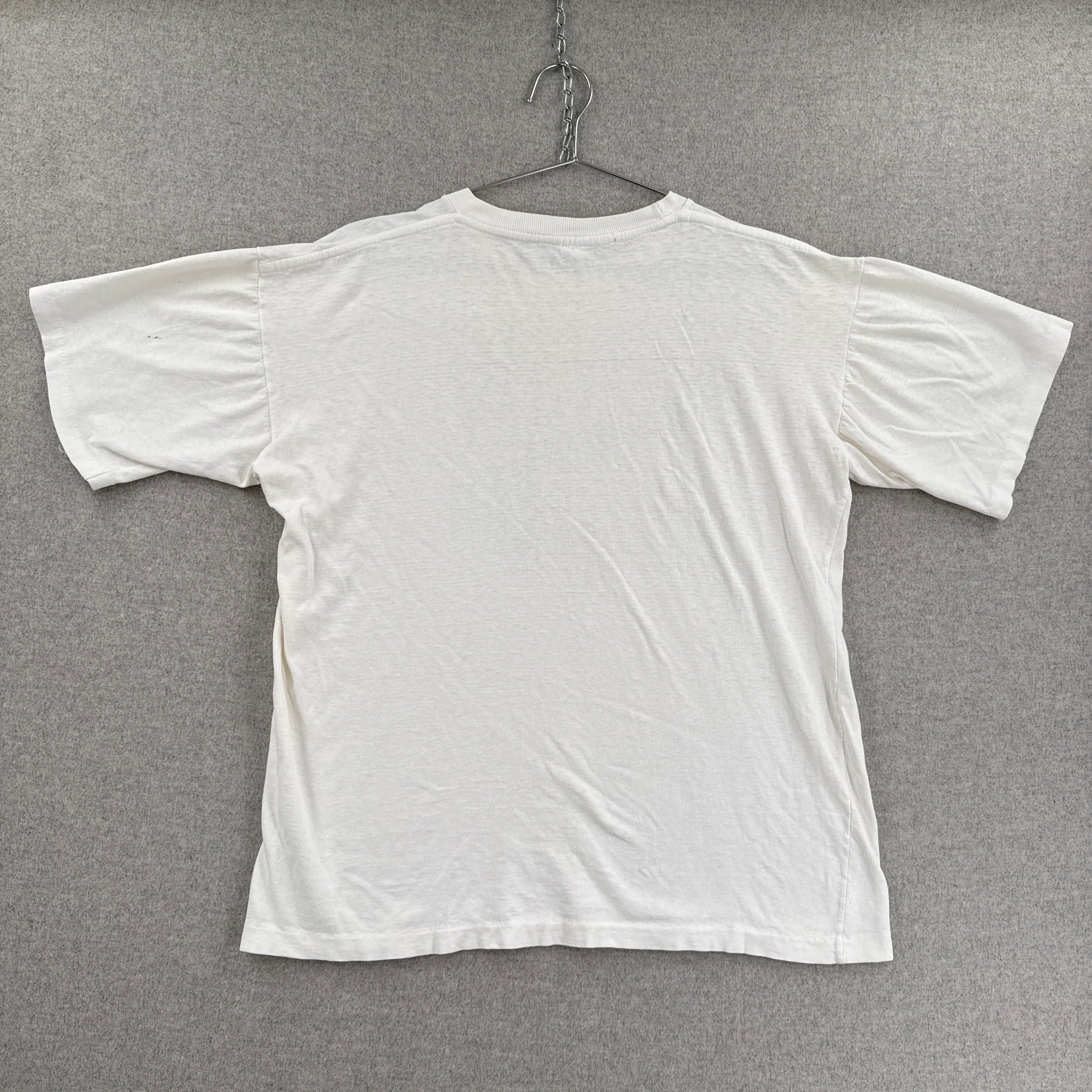 White t-shirt on a gray background