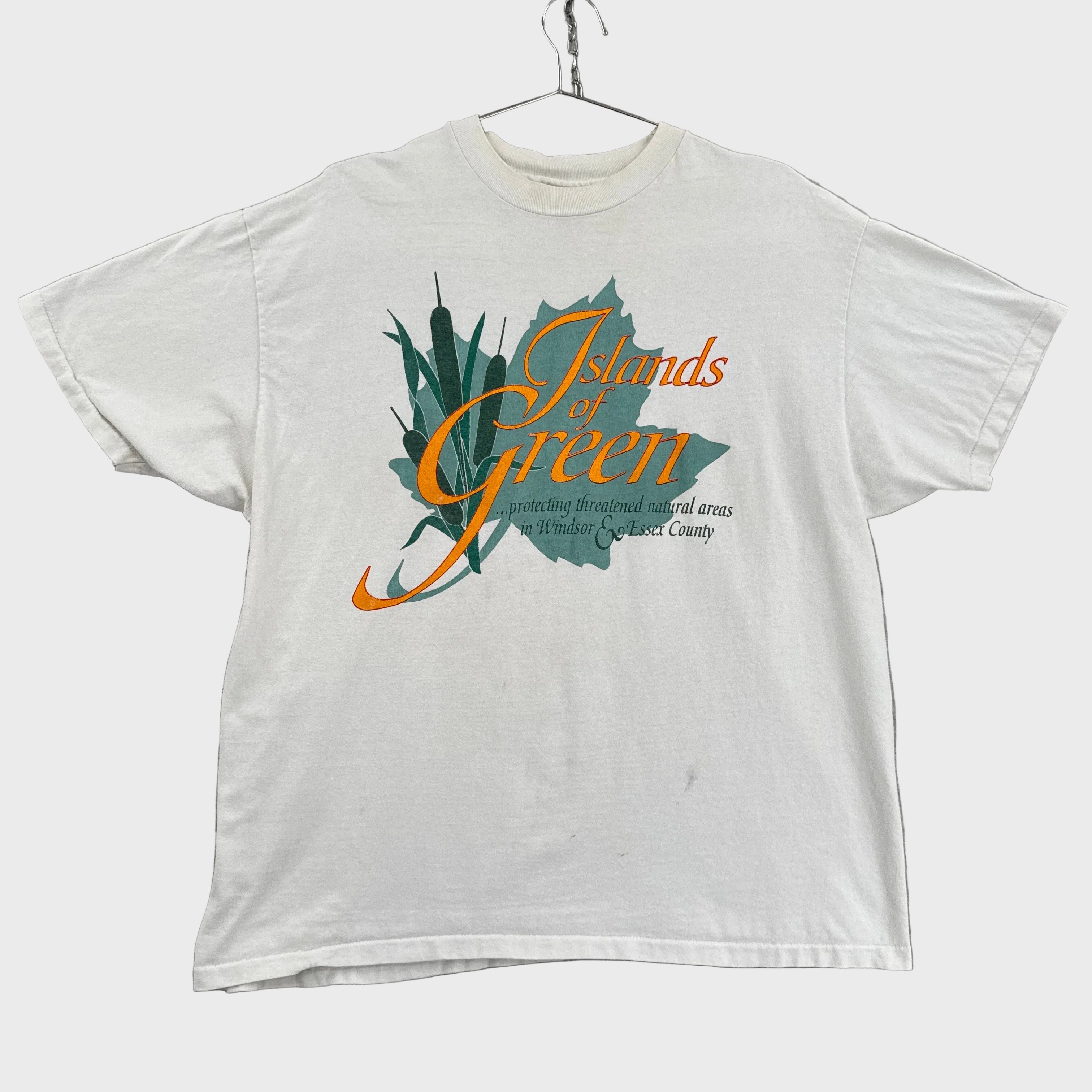 White tank top with a graphic design on a gray background. Islands of Green Windsor Essex County England British design