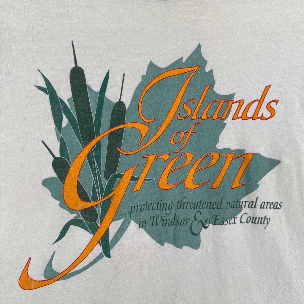 Text 'Islands of Green' with leaf design on a white background