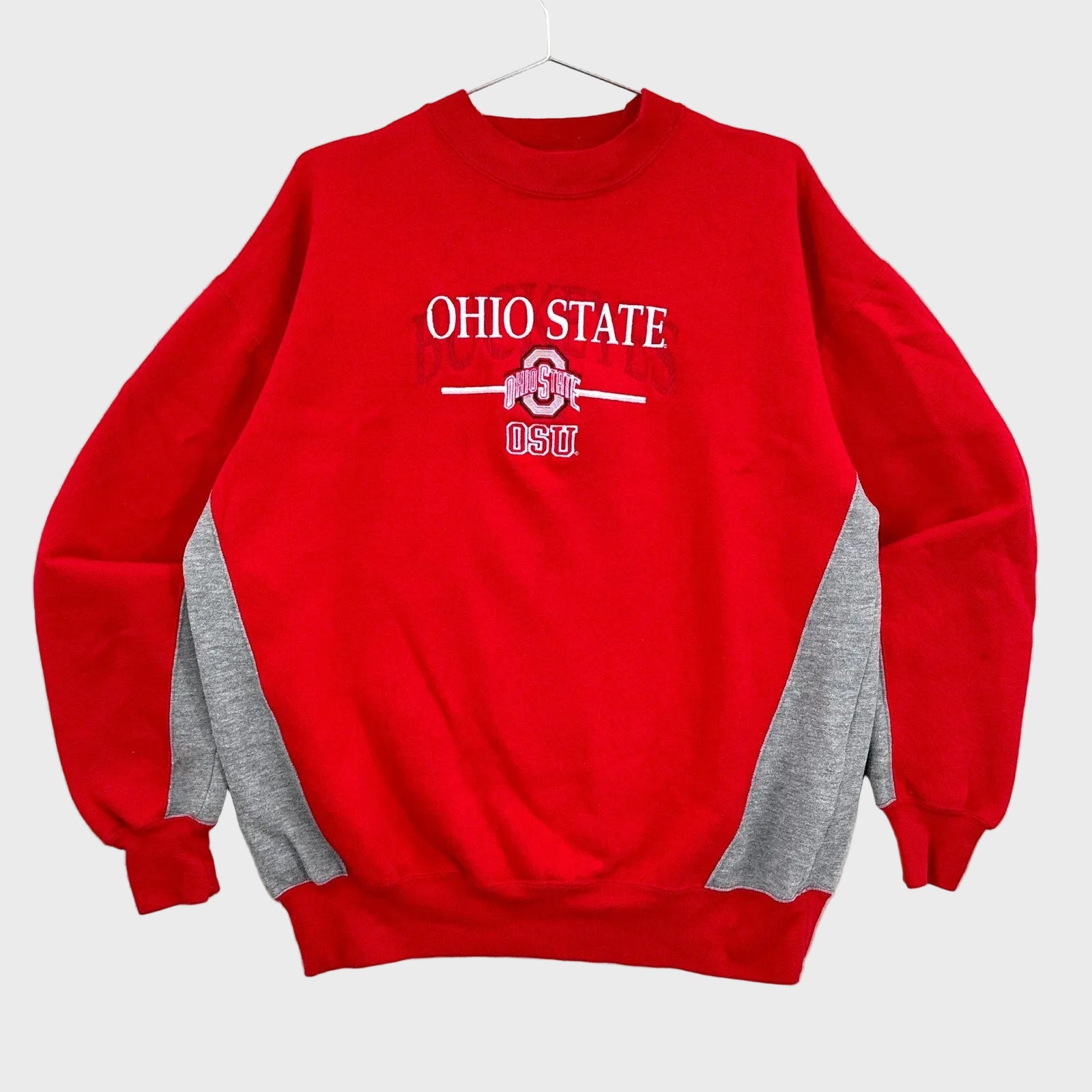 Red Ohio State sweatshirt on a gray background