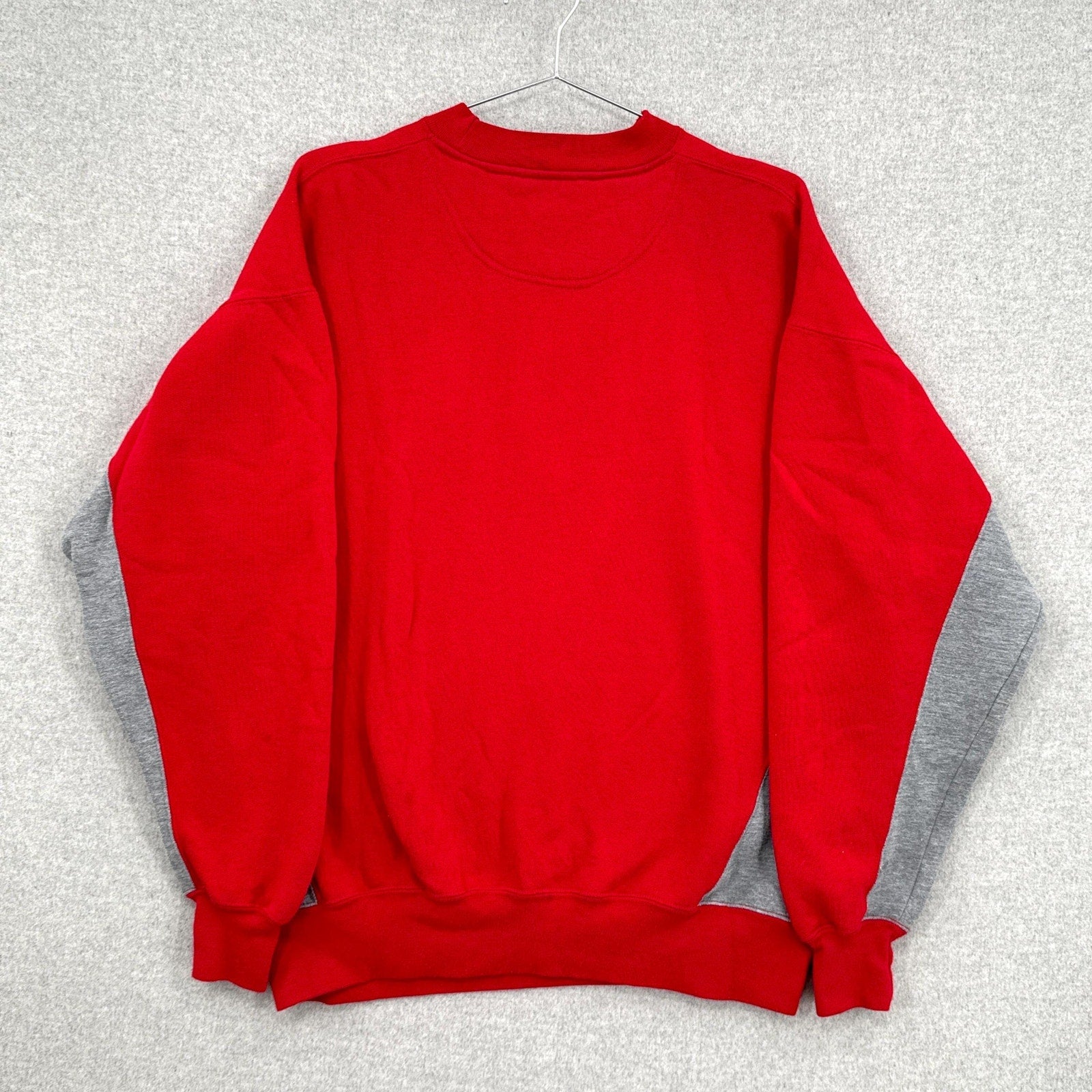 Red sweatshirt on a gray background