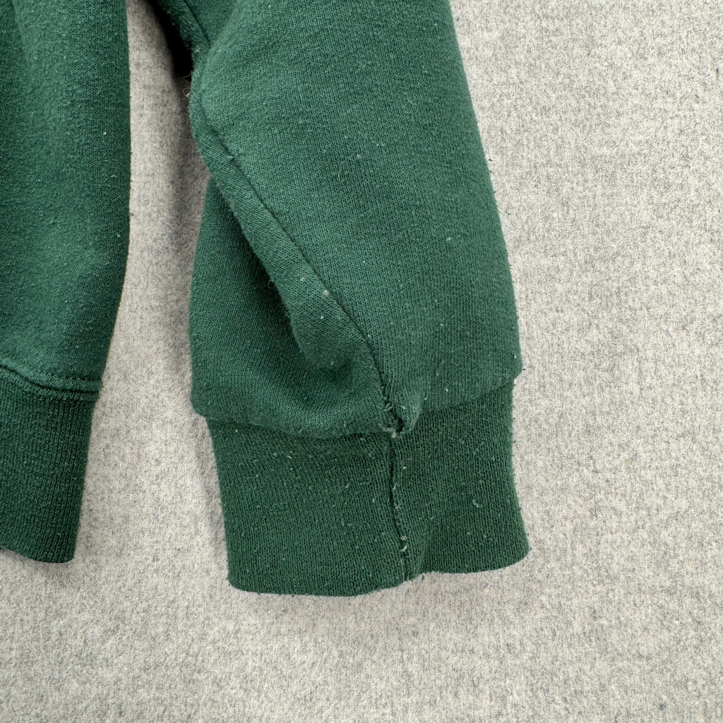 green sleeve with small hole