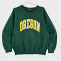 Green sweatshirt with 'OREGON' printed in yellow on a gray background