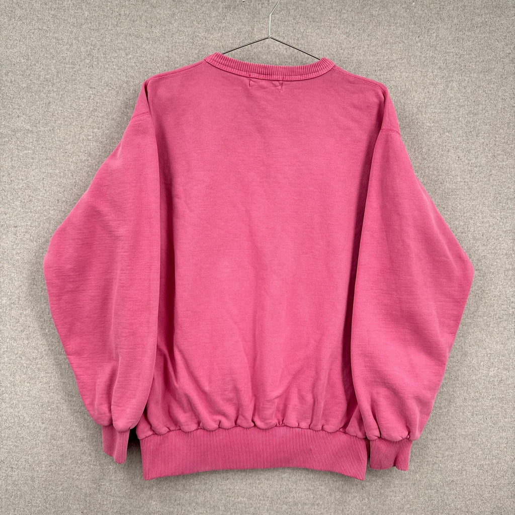 Pink sweatshirt on a gray background