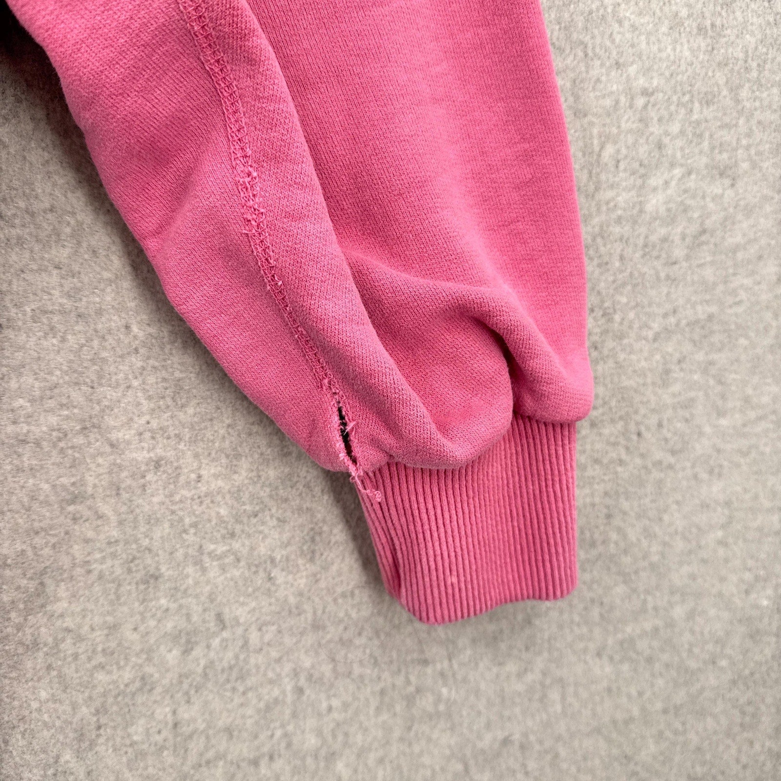 rip on sleeve near wrist