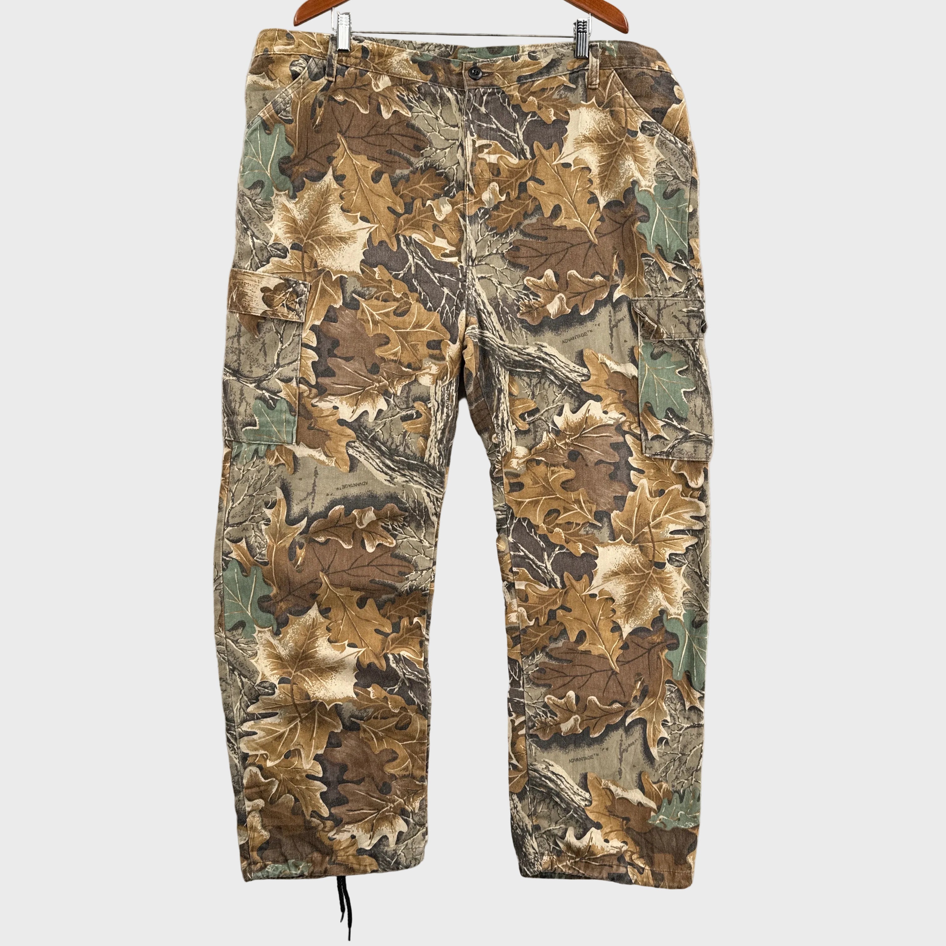 Camouflage-patterned pants on a light gray surface