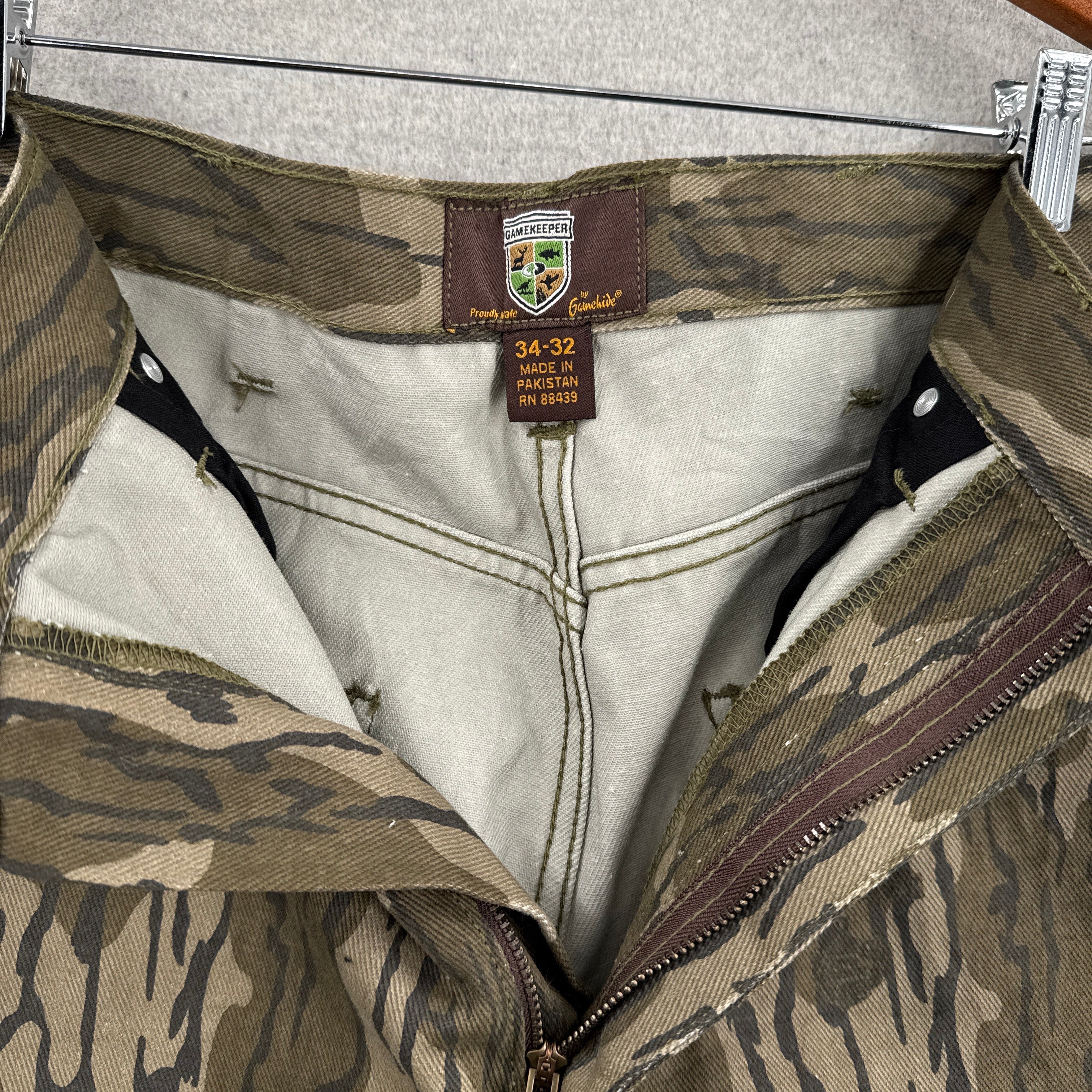 unzipped pants with 34-32 tag