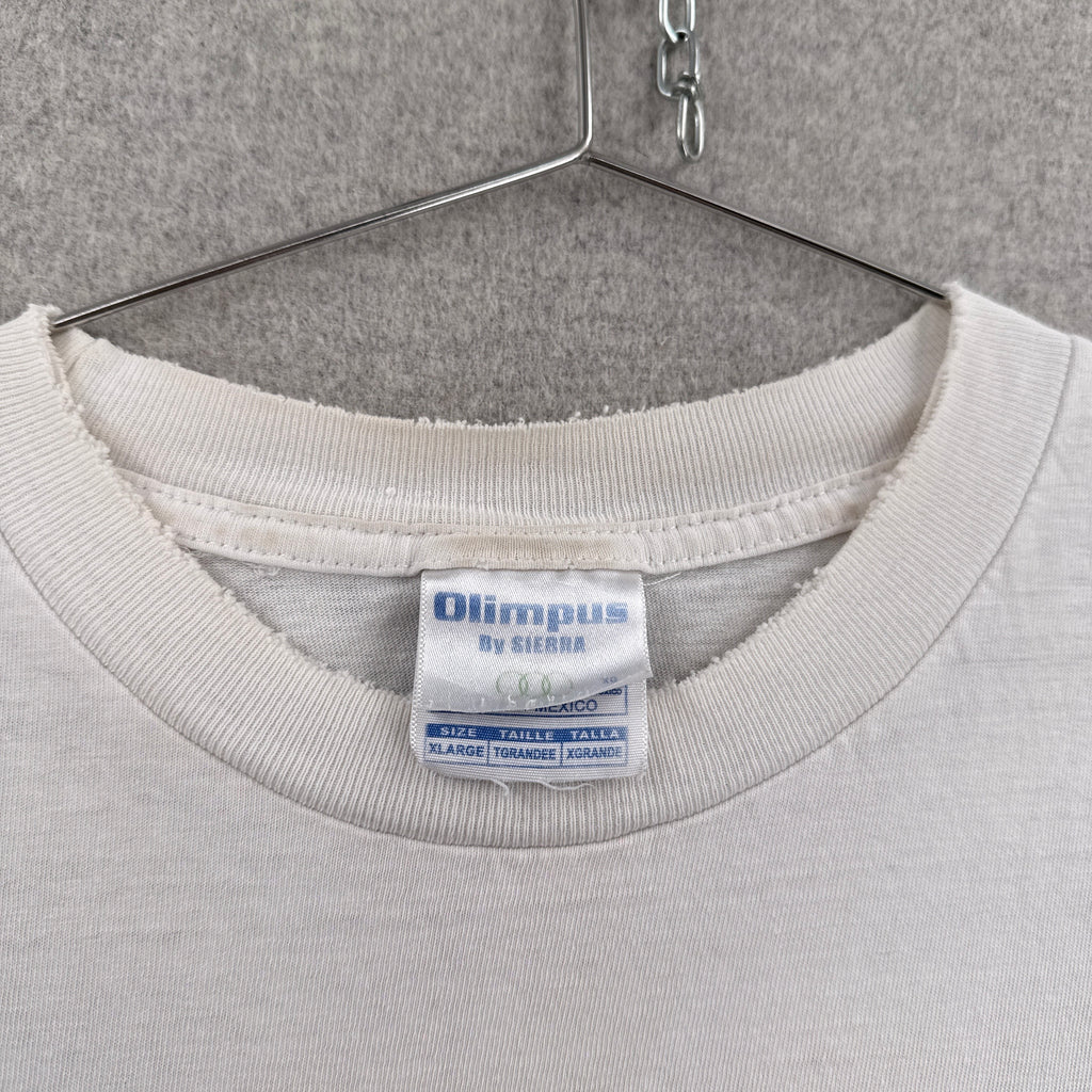 Light gray sweatshirt with a visible label on a hanger against a gray background. tag size XL