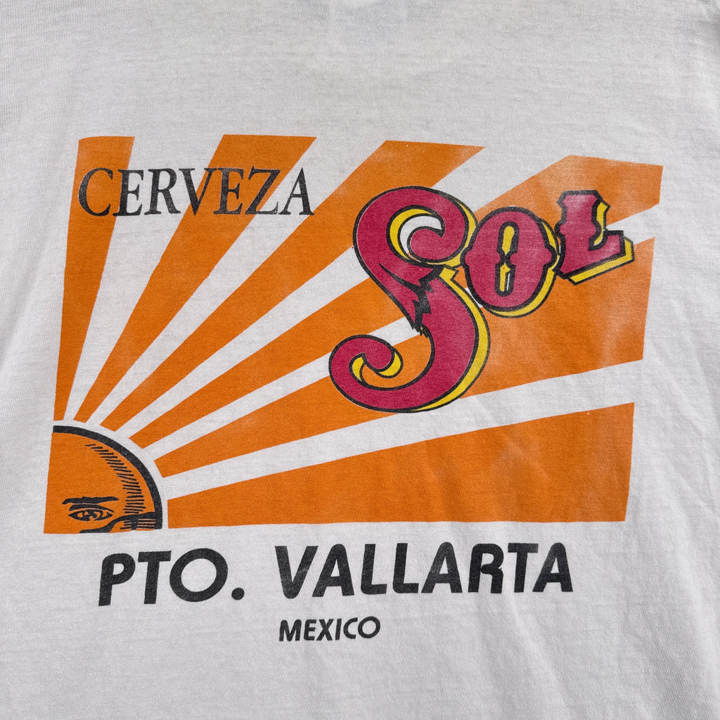 Cerveza logo with 'PTO. Vallarta Mexico' text on a white background