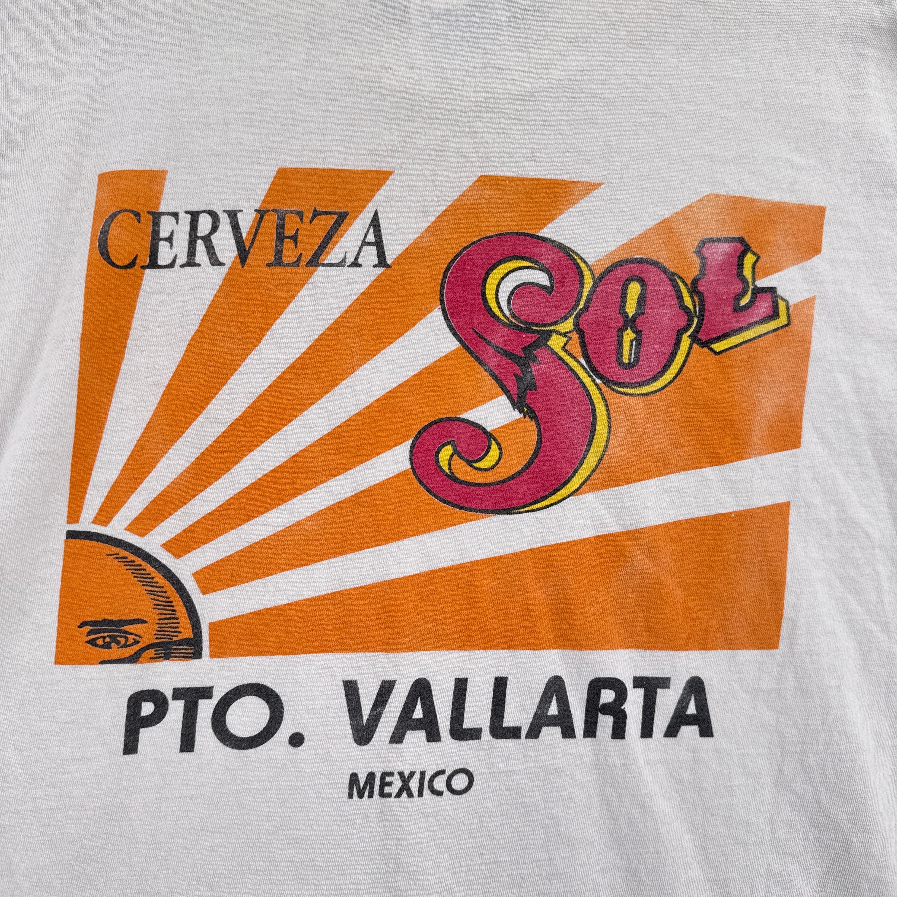 Cerveza logo with 'PTO. Vallarta Mexico' text on a white background