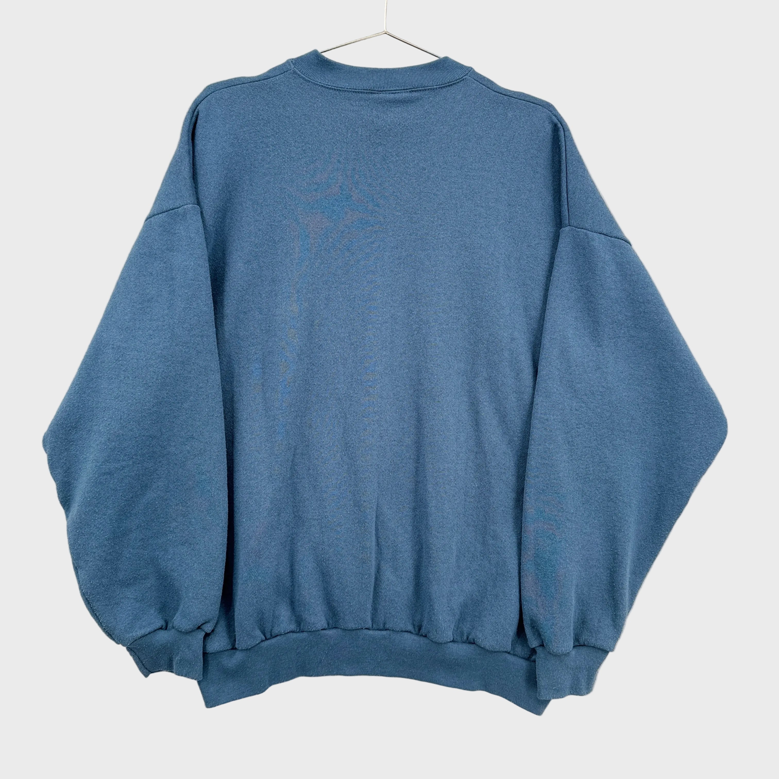 back of blue crewneck sweatshirt, blank
