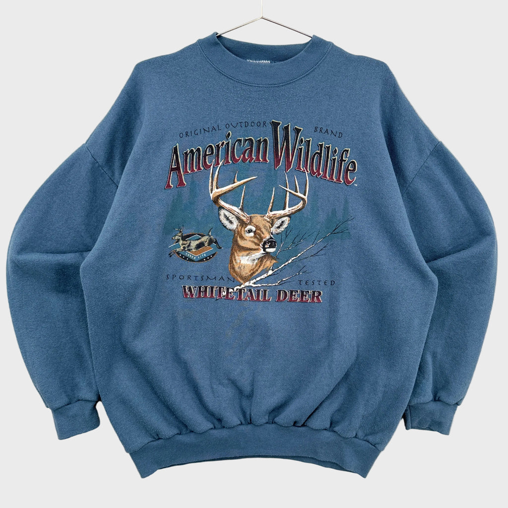 Blue sweatshirt with a deer graphic and 'American Wildlife' text on a white background