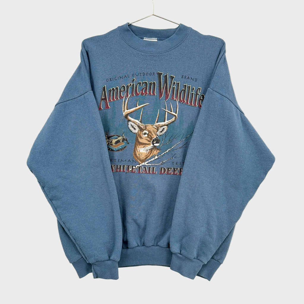 front of the sweatshirt with sleeves folded over not showing visible defects.