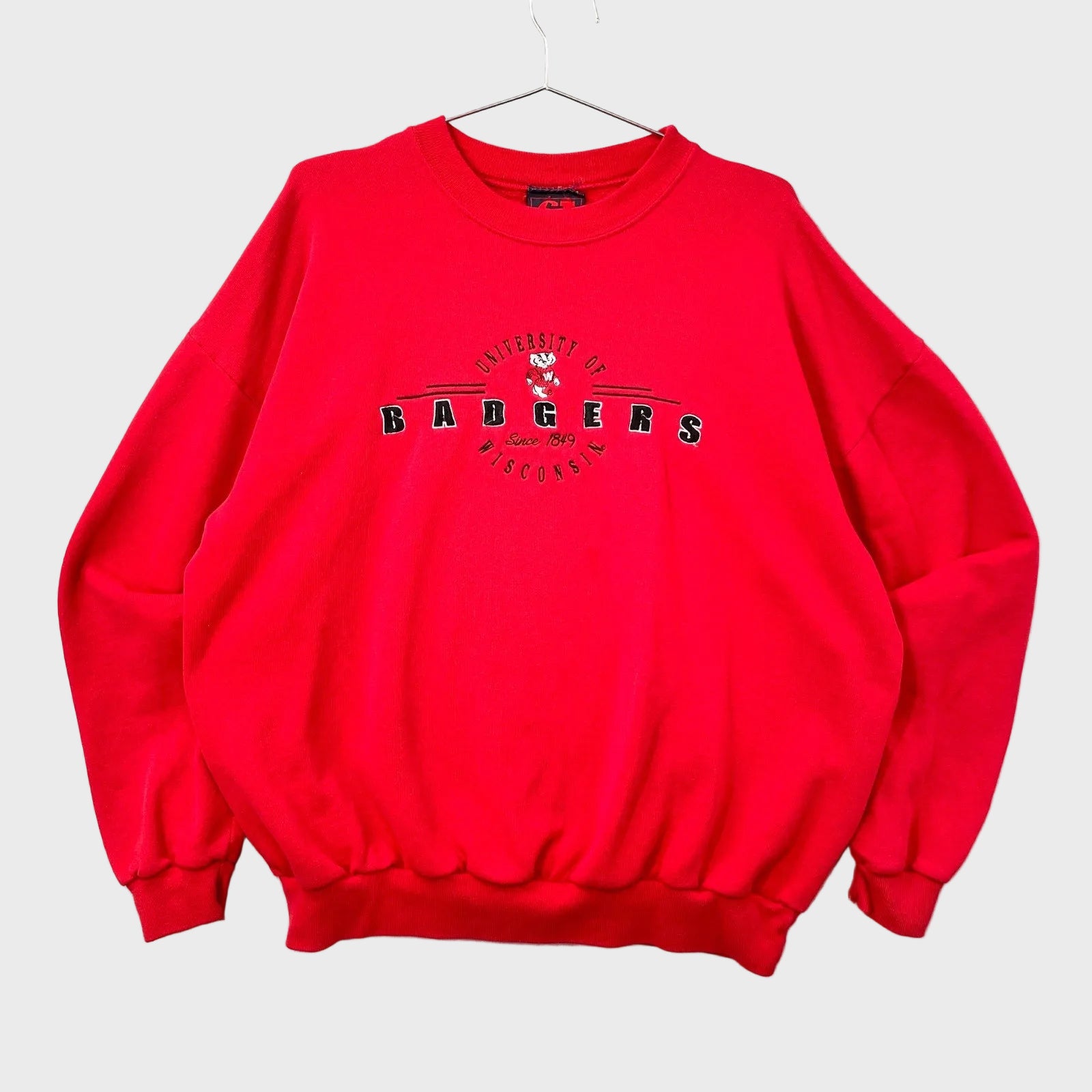Red sweatshirt with 'Badgers' text on a gray background