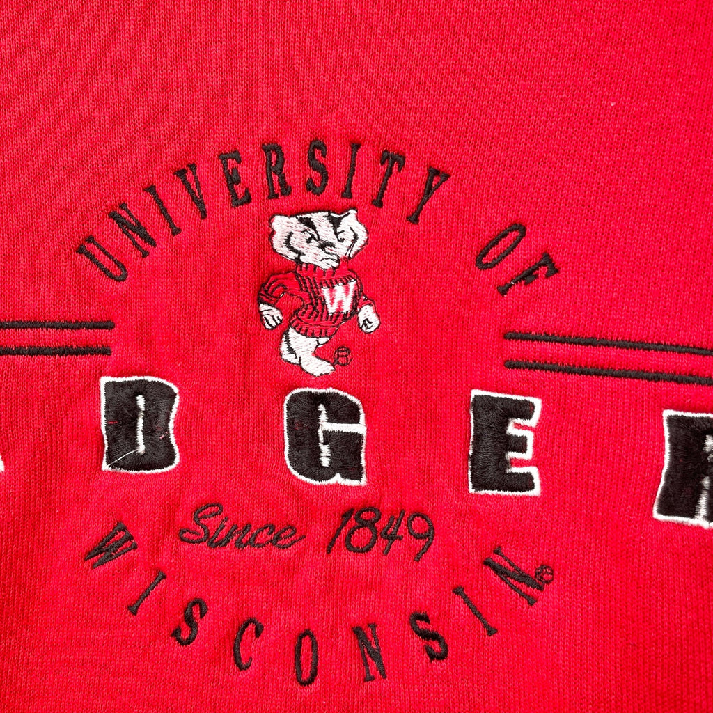 Red fabric with 'University of Wisconsin' and bear mascot print