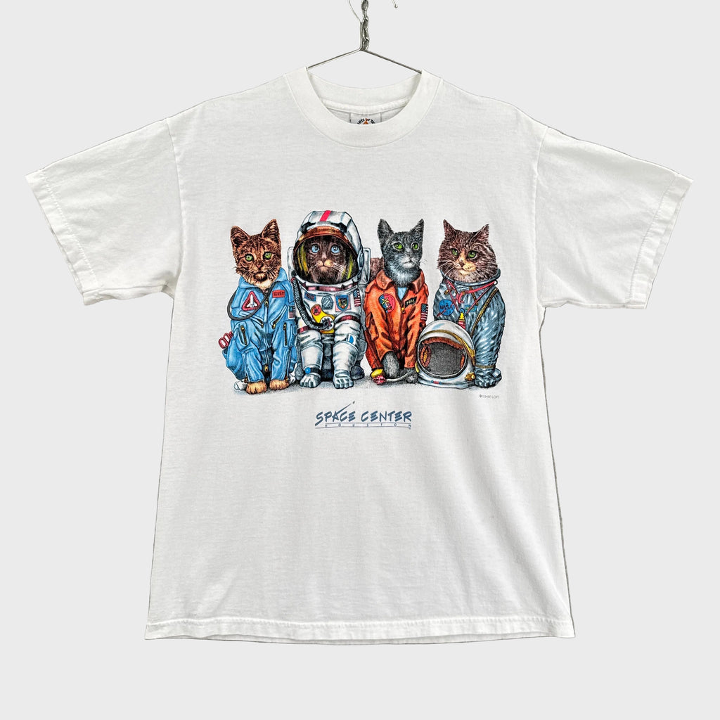 White tank top with space-themed cat illustration on a gray background