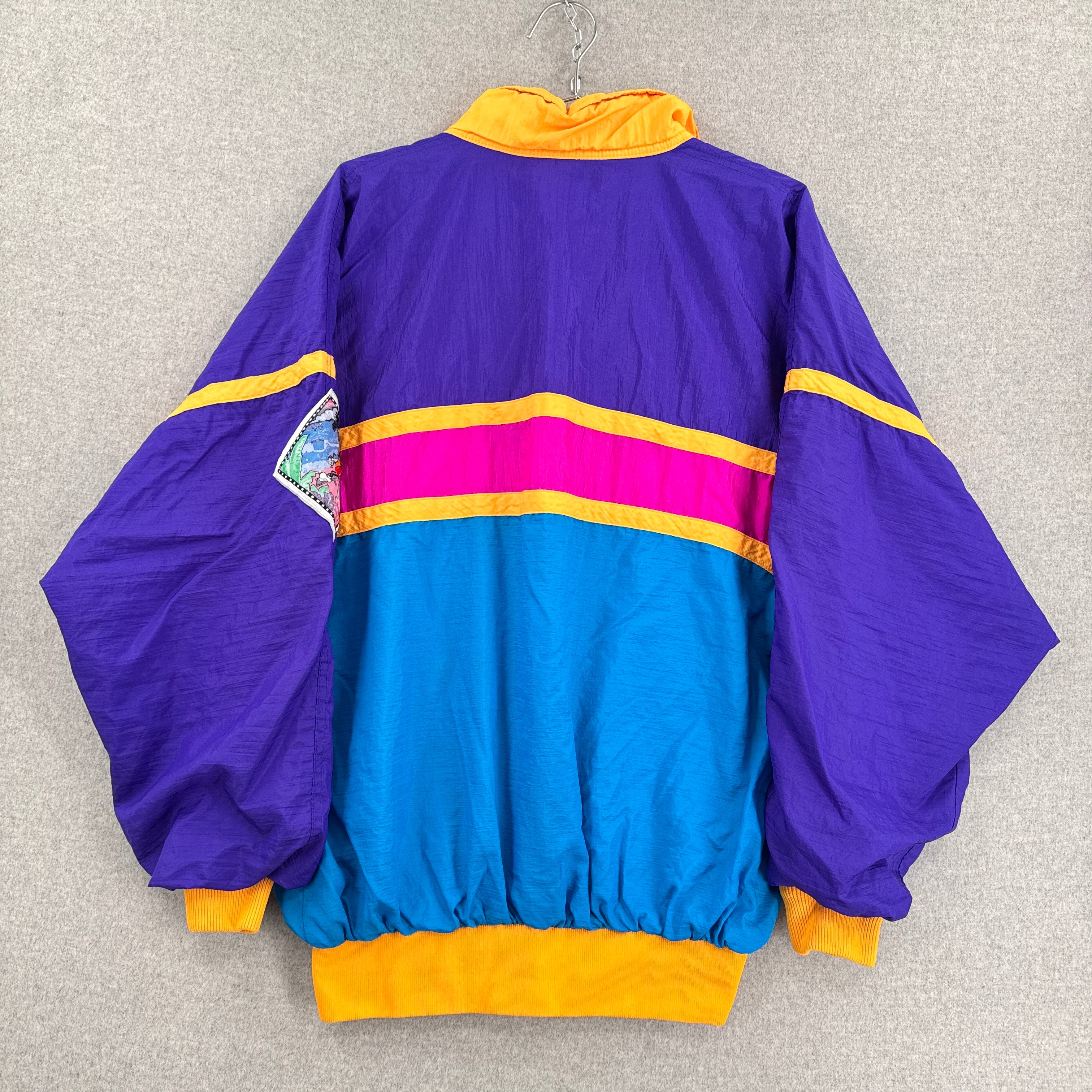 Colorful jacket with purple, blue, pink, and yellow accents on a gray background back
