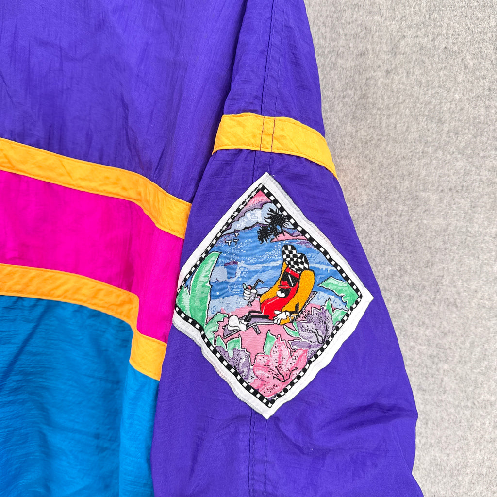 Colorful jacket with a patch on a gray background. cartoon hot dog suntanning on beach graphic