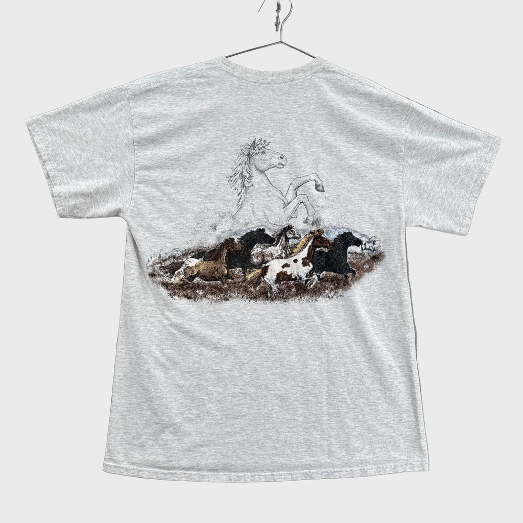 Gray shirt with a graphic design of a horses running on the back