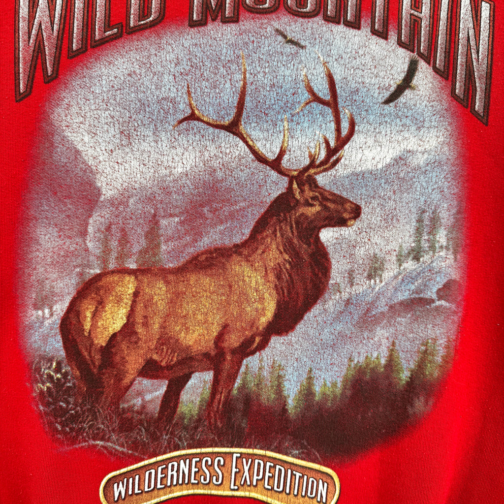 Elk illustration on a red background with 'Wild Mountain Wilderness Expedition' text.