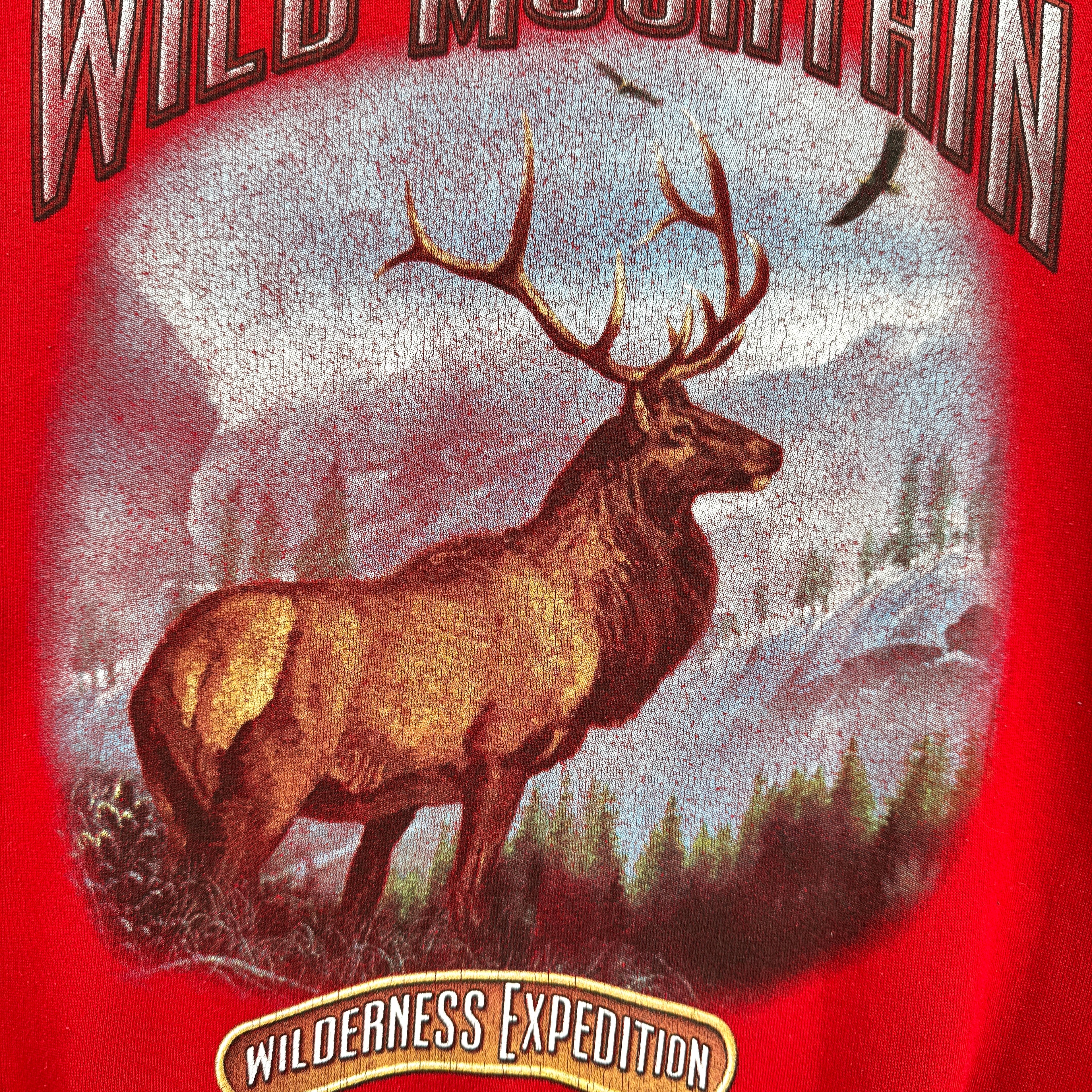 Elk illustration on a red background with 'Wild Mountain Wilderness Expedition' text.