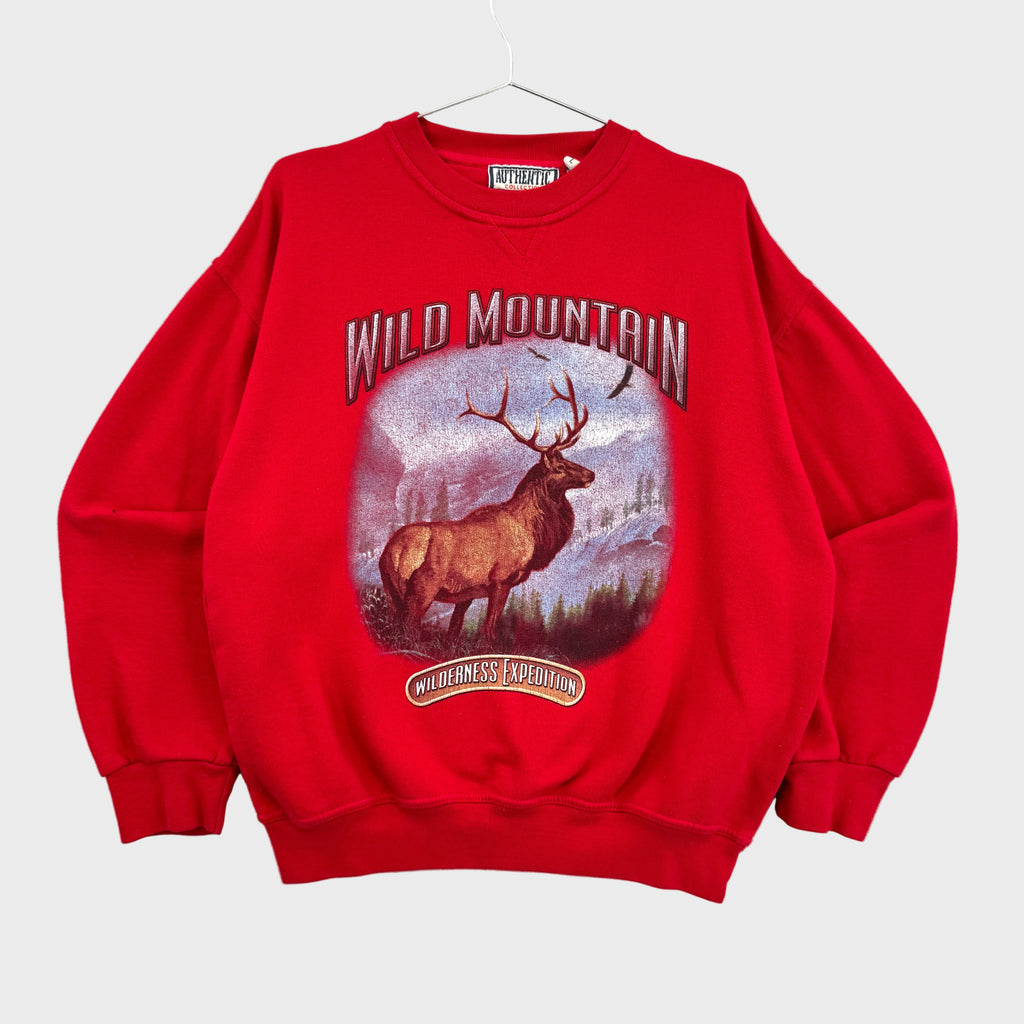 Red sweatshirt with a graphic of an elk and 'Wild Mountain' text on a gray background
