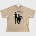 Beige t-shirt with Fleetwood Mac Rumours tour graphic on a gray background