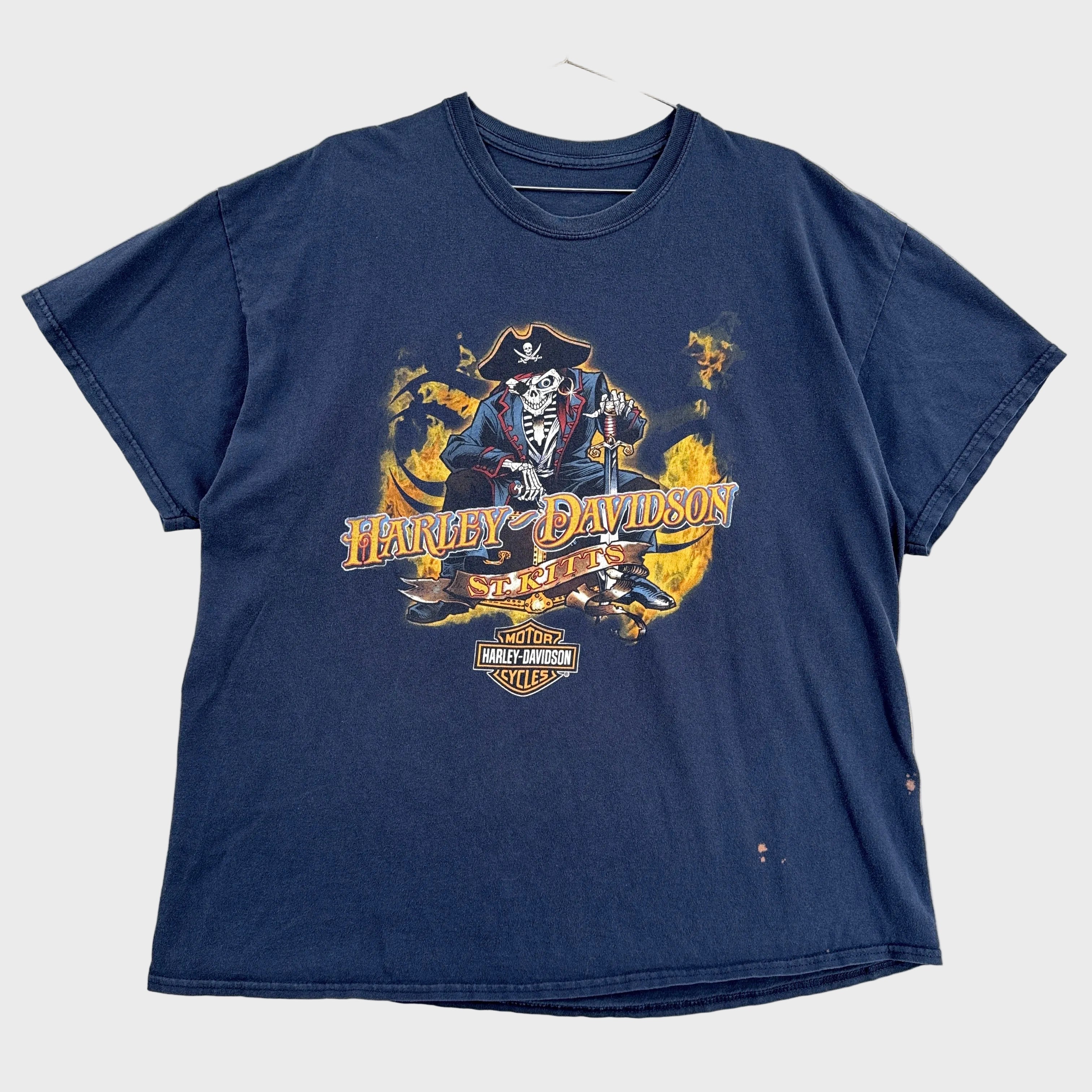 Navy blue t-shirt with Harley Davidson graphic on a beige textured background