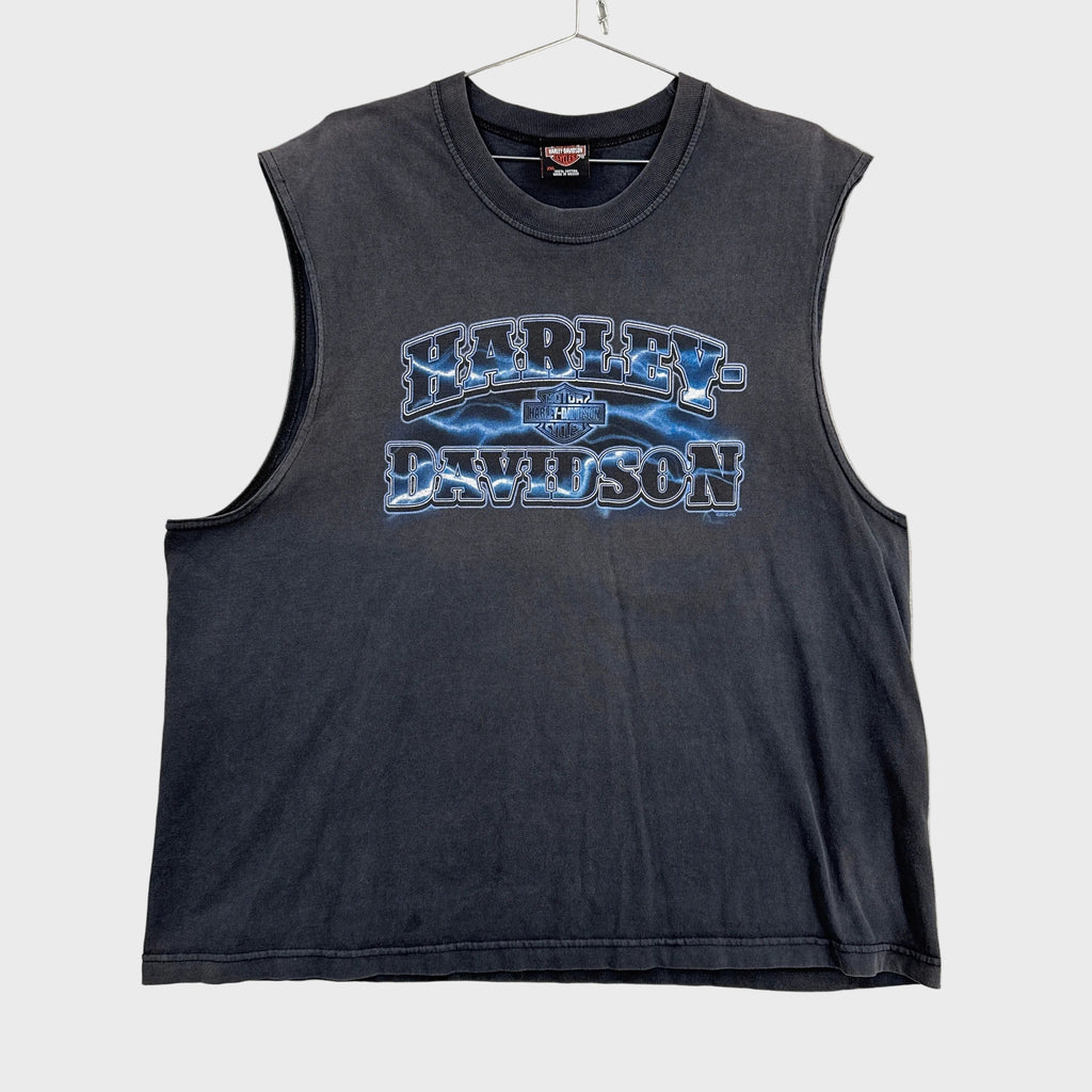 Black sleeveless shirt with Harley Davidson logo on a gray background