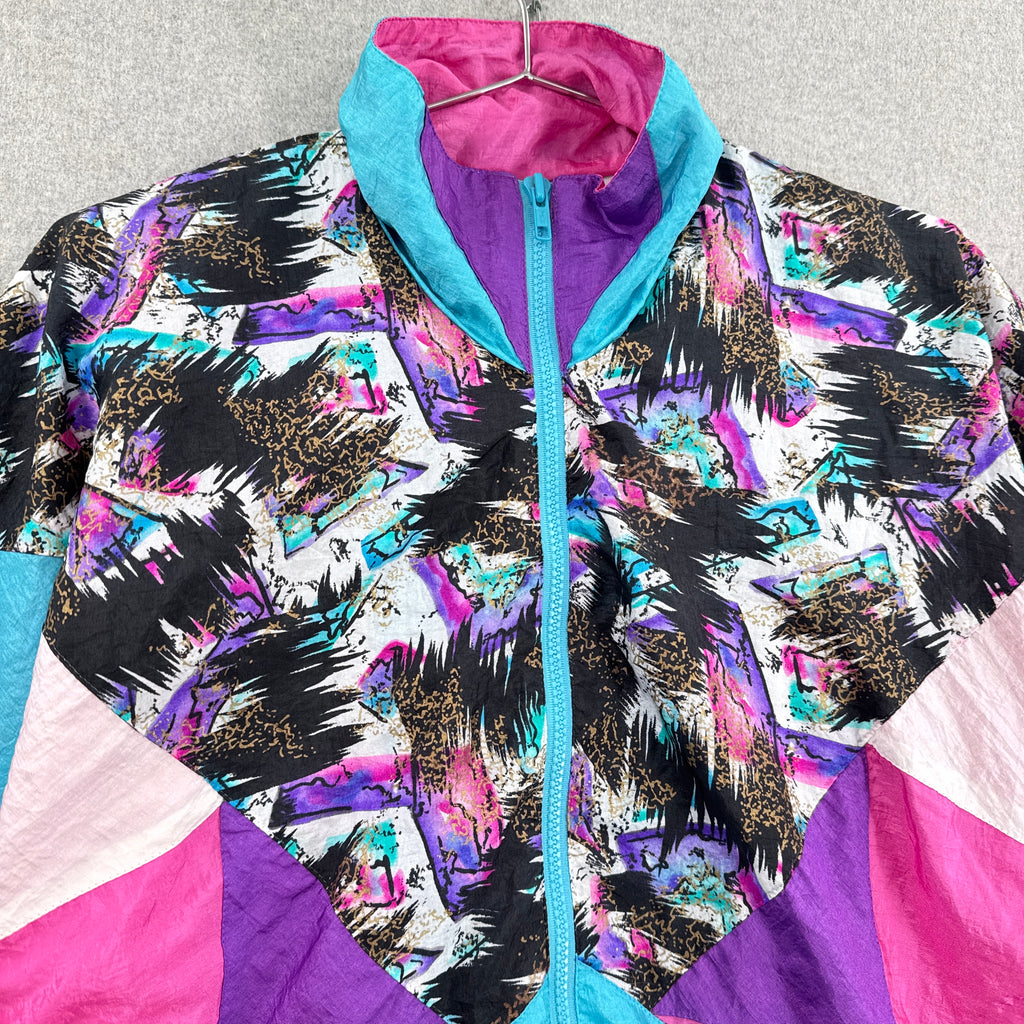 Colorful jacket with abstract pattern on a light gray background