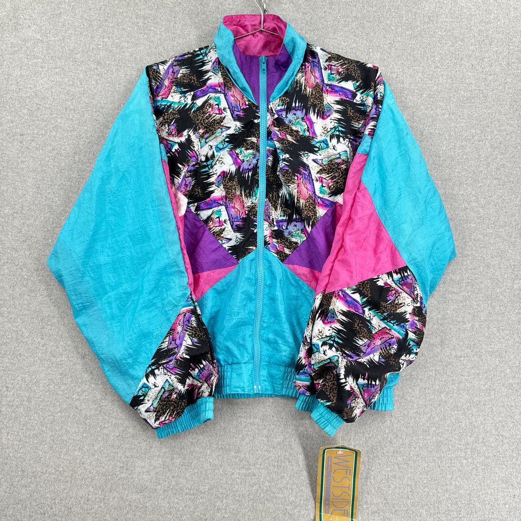 Colorful jacket with abstract pattern on a gray background. Blue, pink, purple print