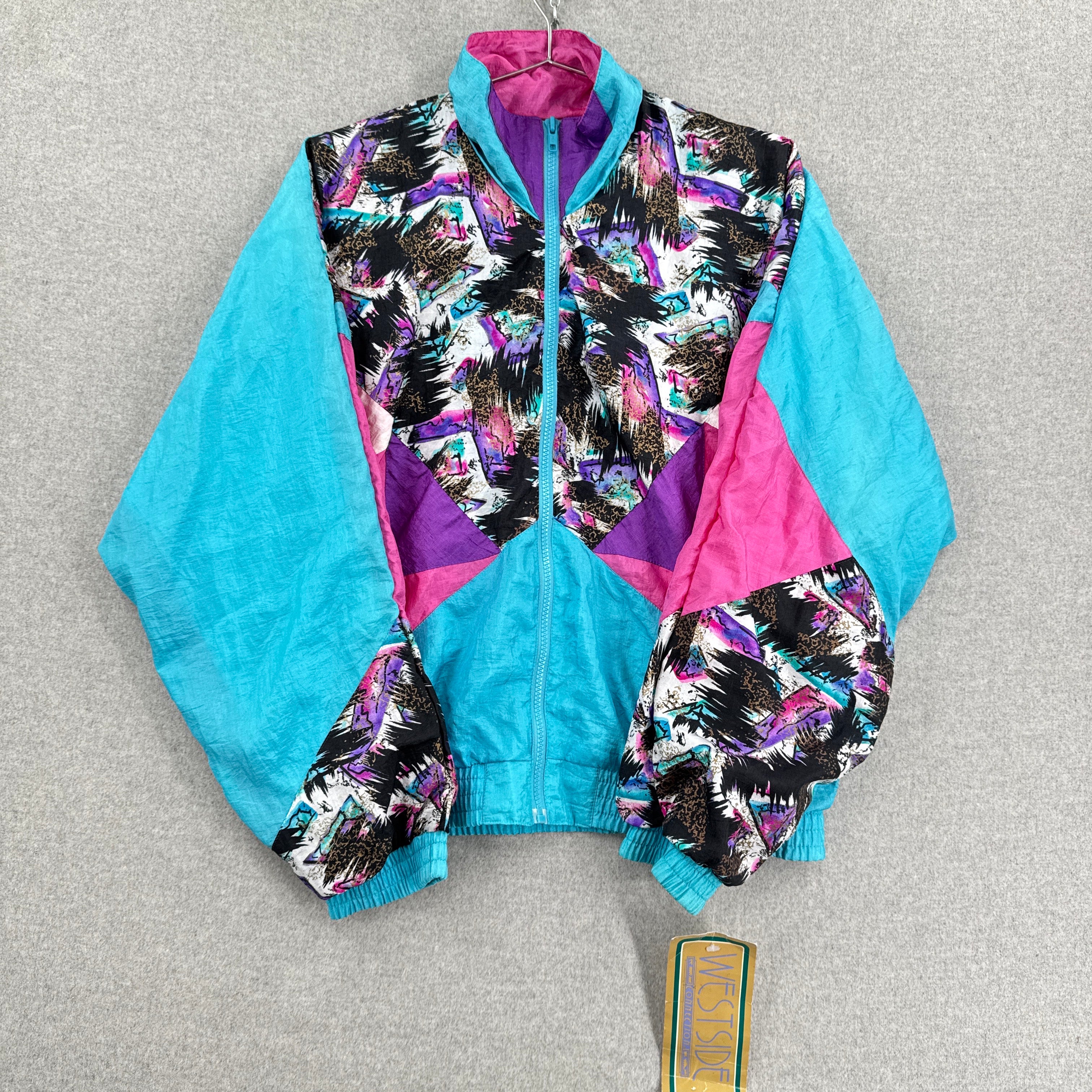 Colorful jacket with abstract pattern on a gray background. Blue, pink, purple print