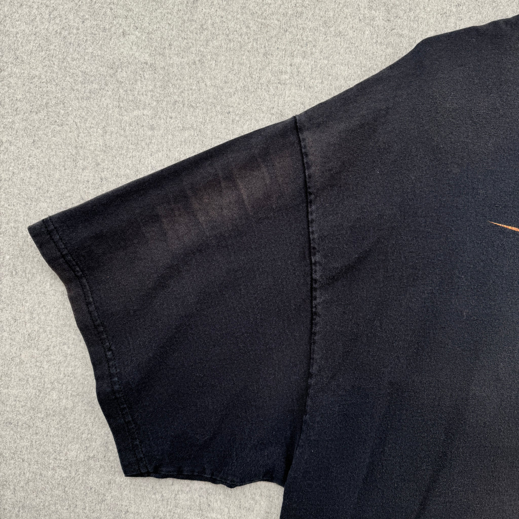 faded discolouration on sleeve of shirt