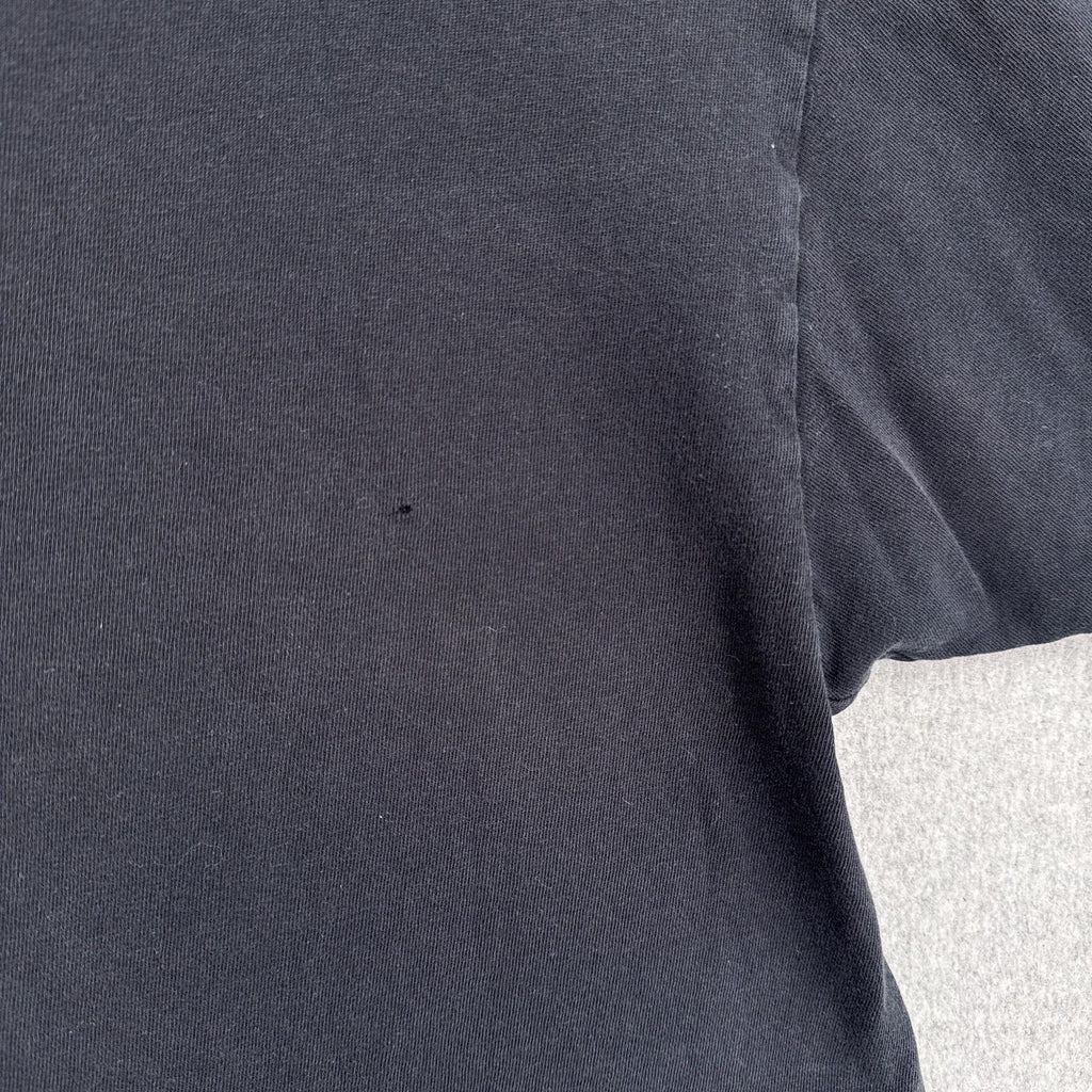 hole on the back by the armpit