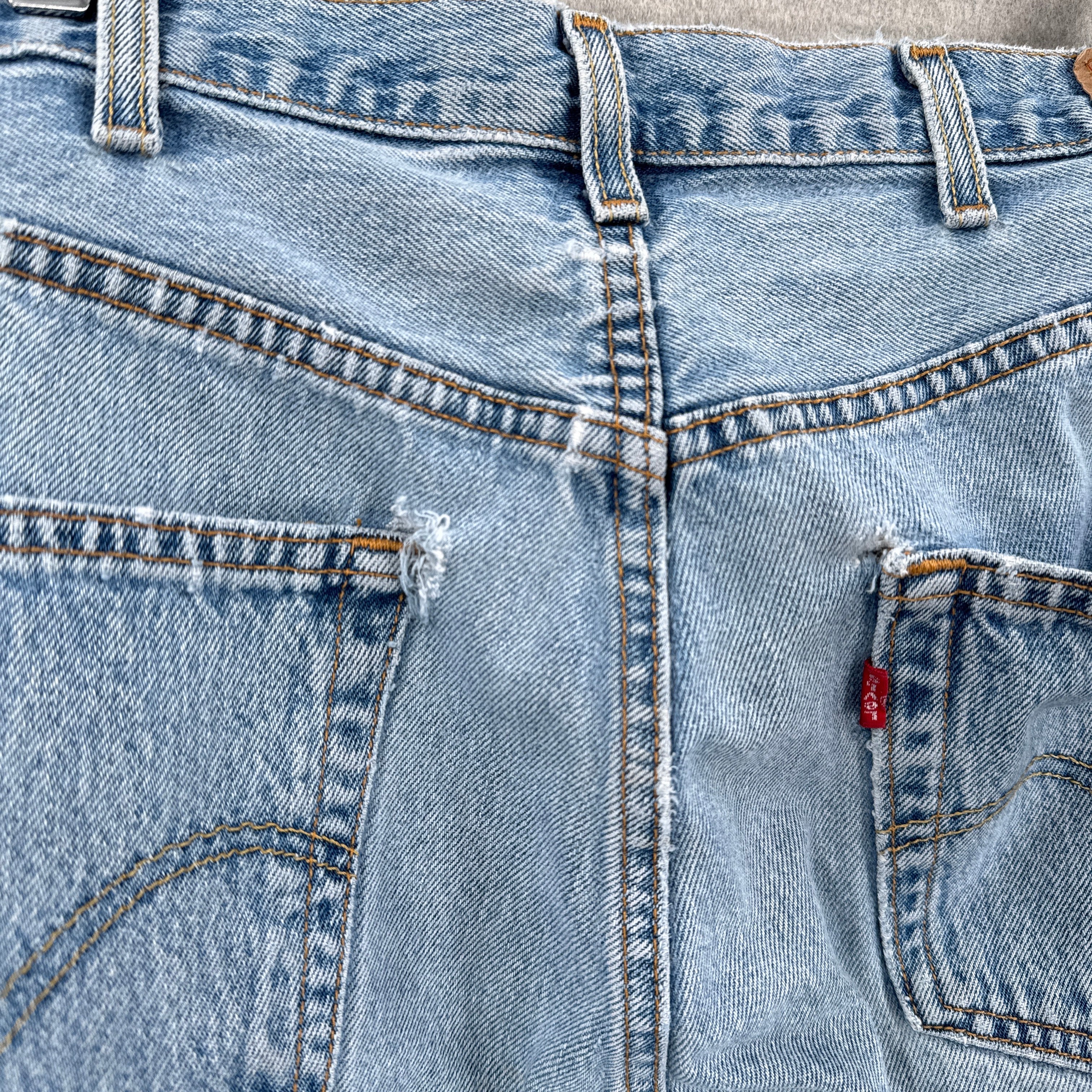 back pockets holes near the stitching