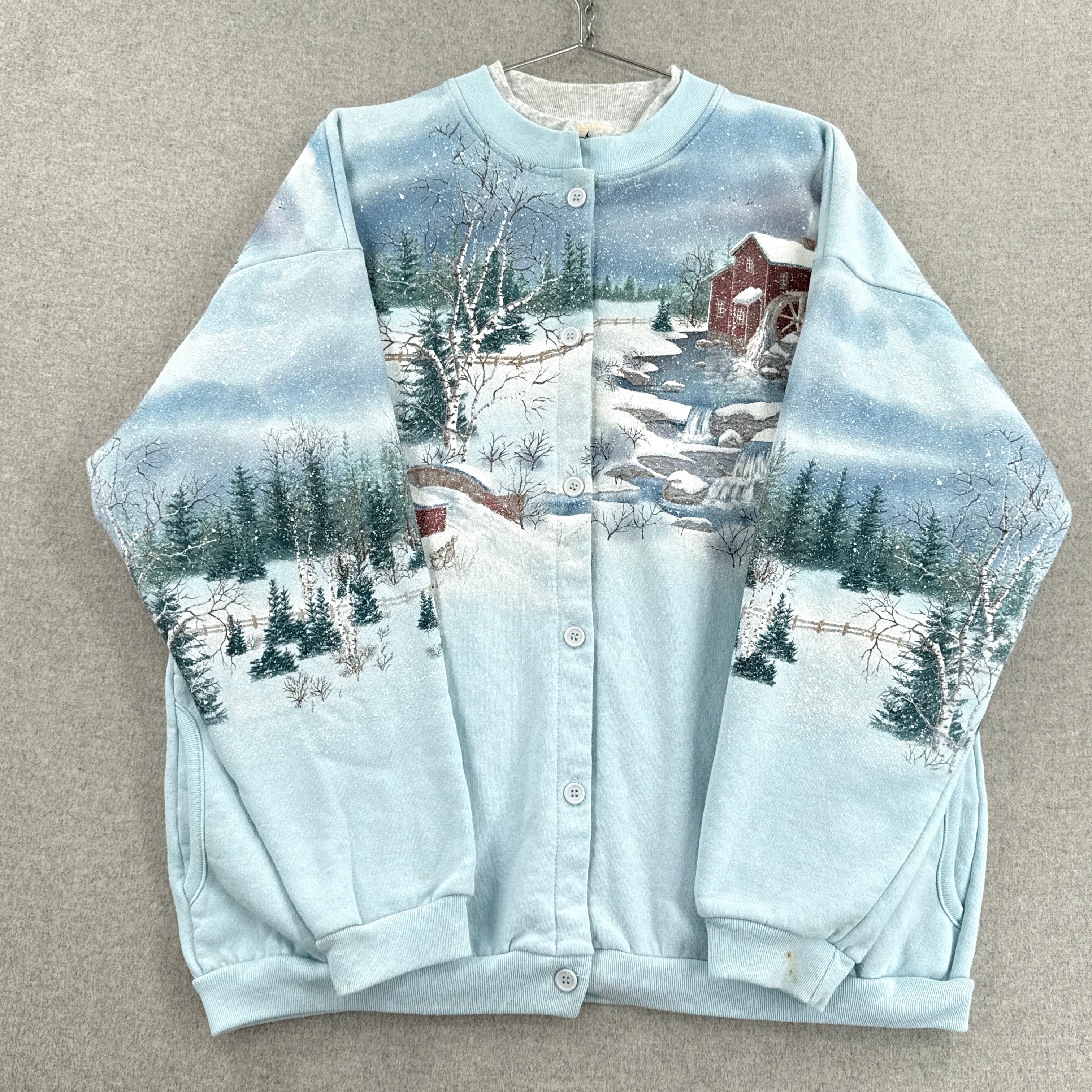 sweatshirt showing sleeves folded over