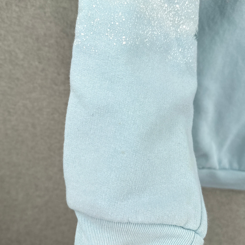 sleeve showing tiny stain spot