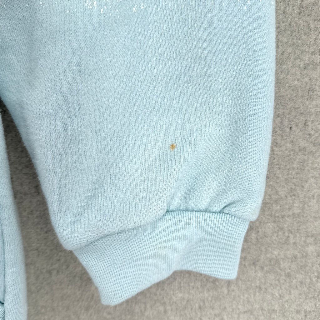 sleeve showing small stain spot