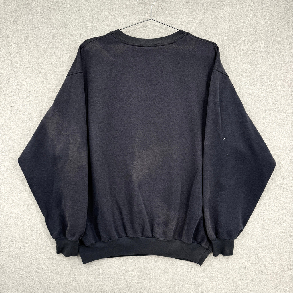 Black sweatshirt on a hanger against a neutral background. Back of sweater showing discolouration