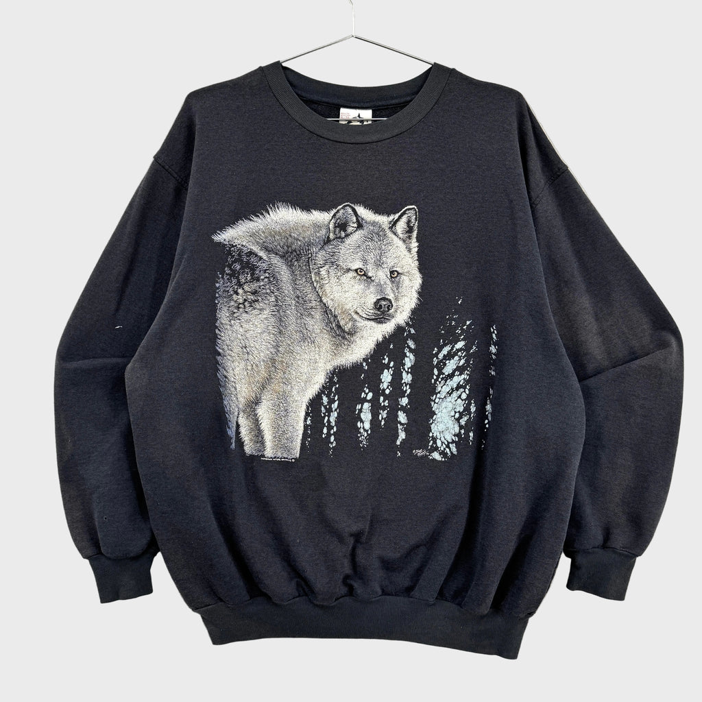 Black sweatshirt with a wolf graphic on a white background