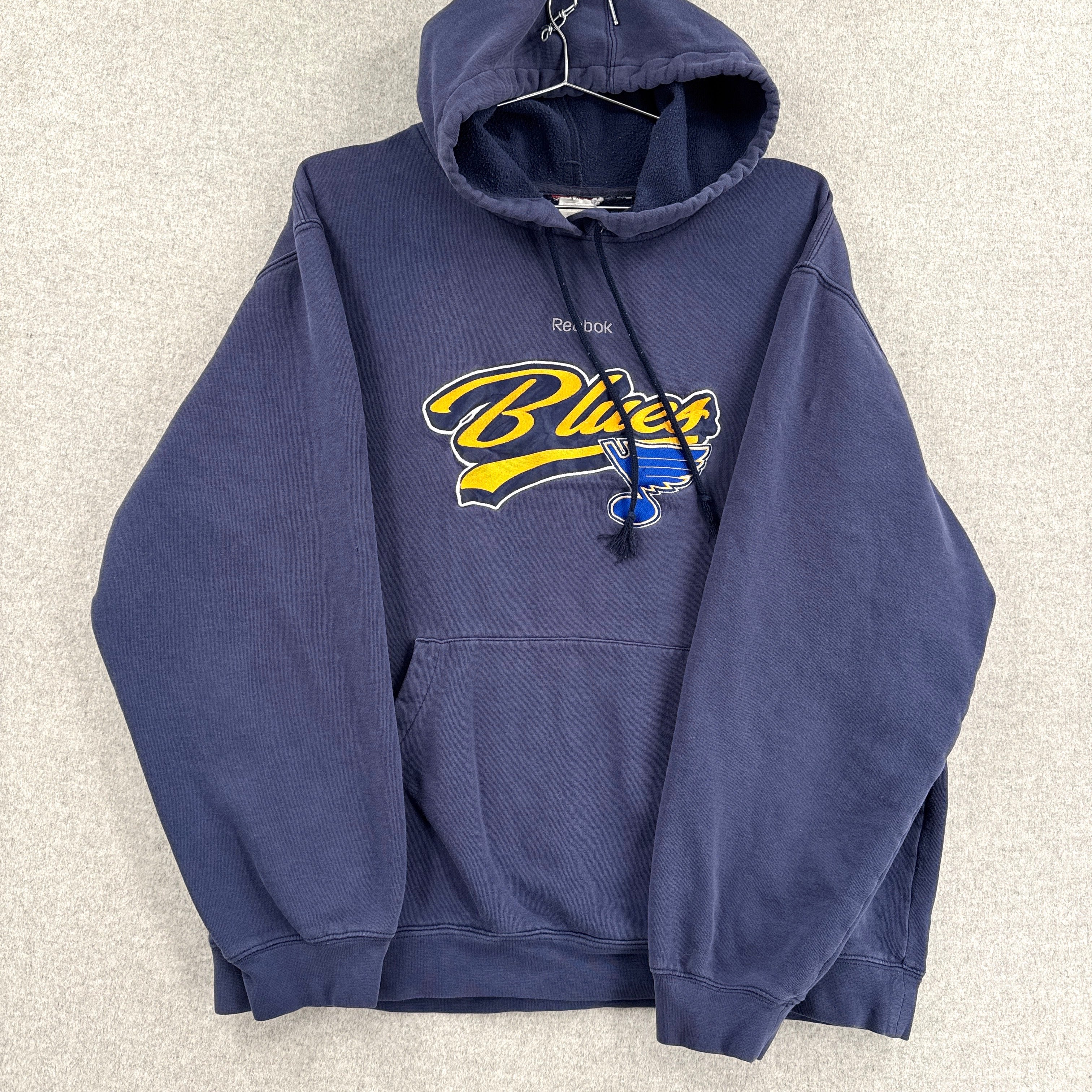 Navy blue hoodie with 'Blues' logo on a light gray background